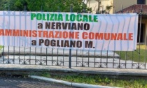 Striscione di protesta contro il Comando unico di Polizia Locale