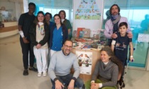 Nuovi libri per la Pediatria del Fornaroli grazie all'iniziativa della "Cesta solidale"